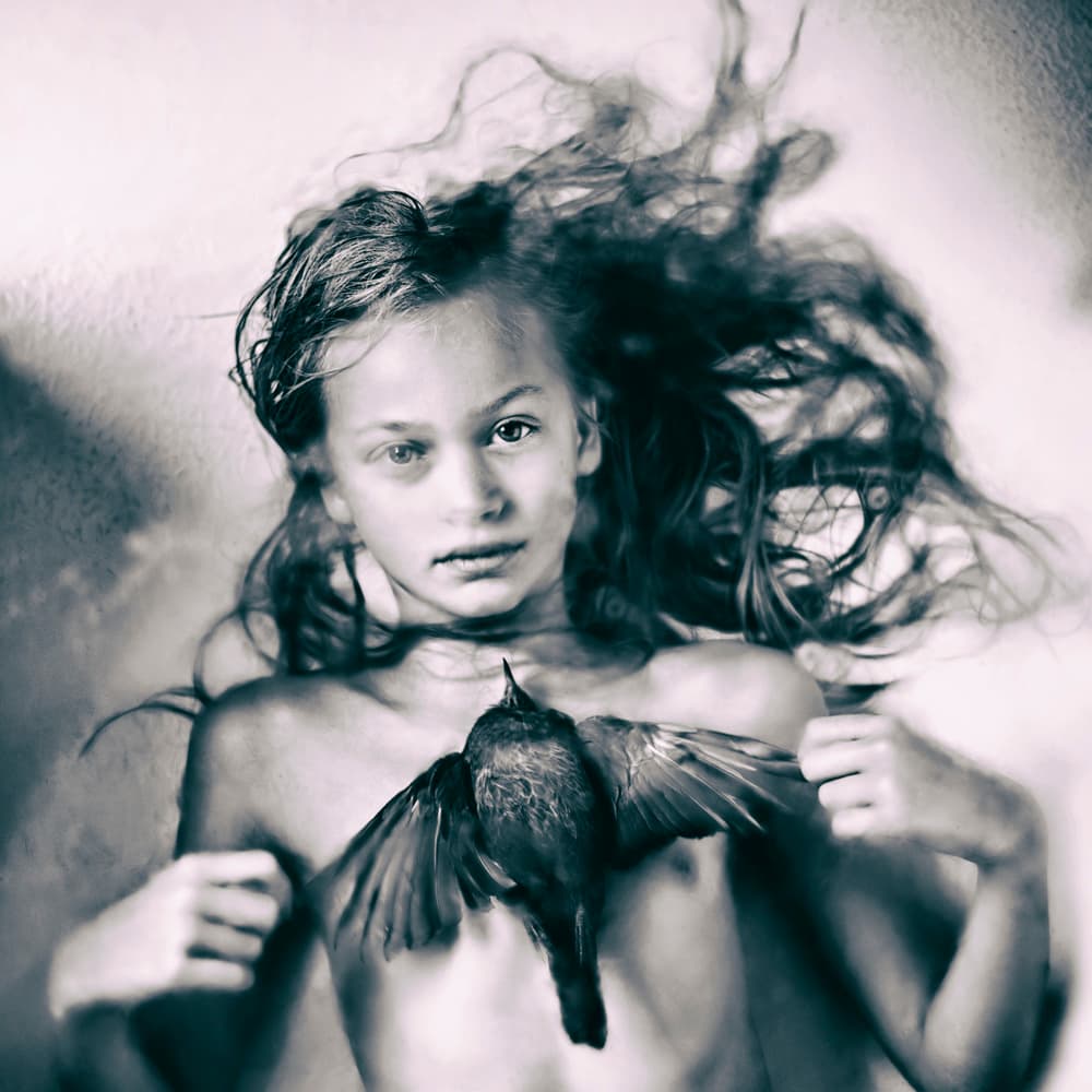 Ethereal Girl and Bird by Ewa Cwikla — canvas wall art