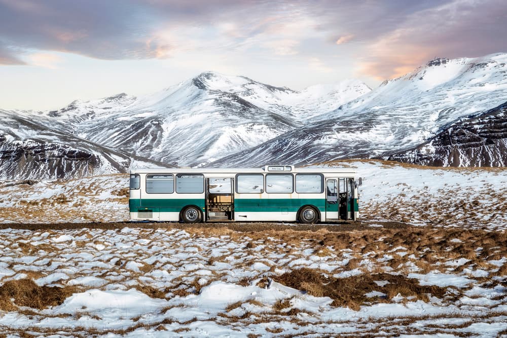 Classic Bus Winter Mountains by Paco Herrero — canvas wall art