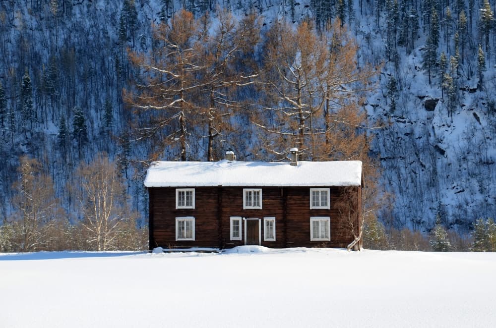 Snowy Winter Cabin by Mette Caroline Strøksnes — canvas wall art