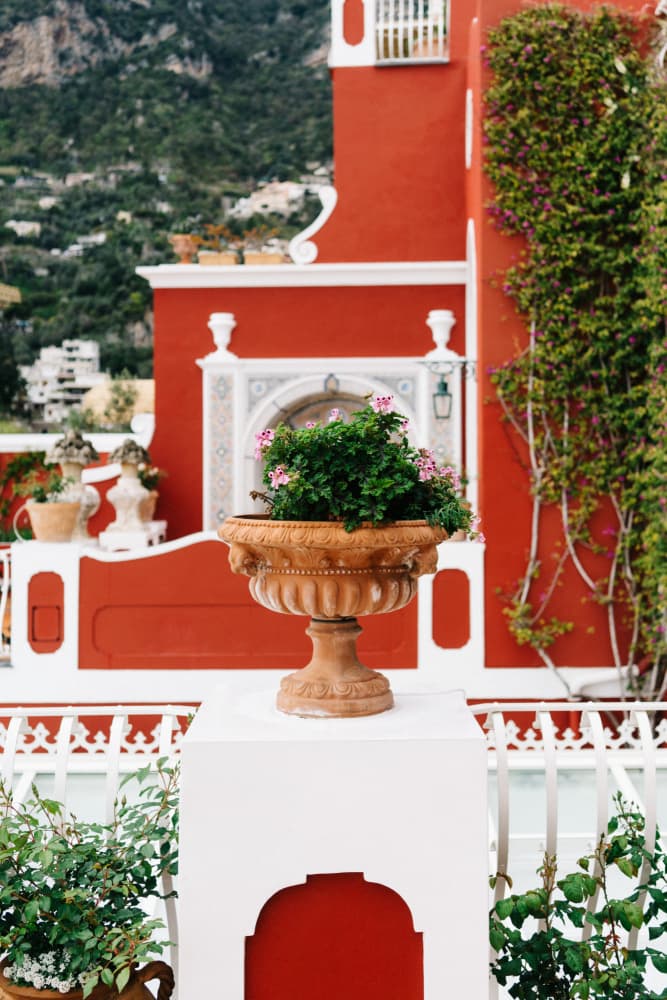 Red Building Coastal View by Bethany Young — canvas wall art
