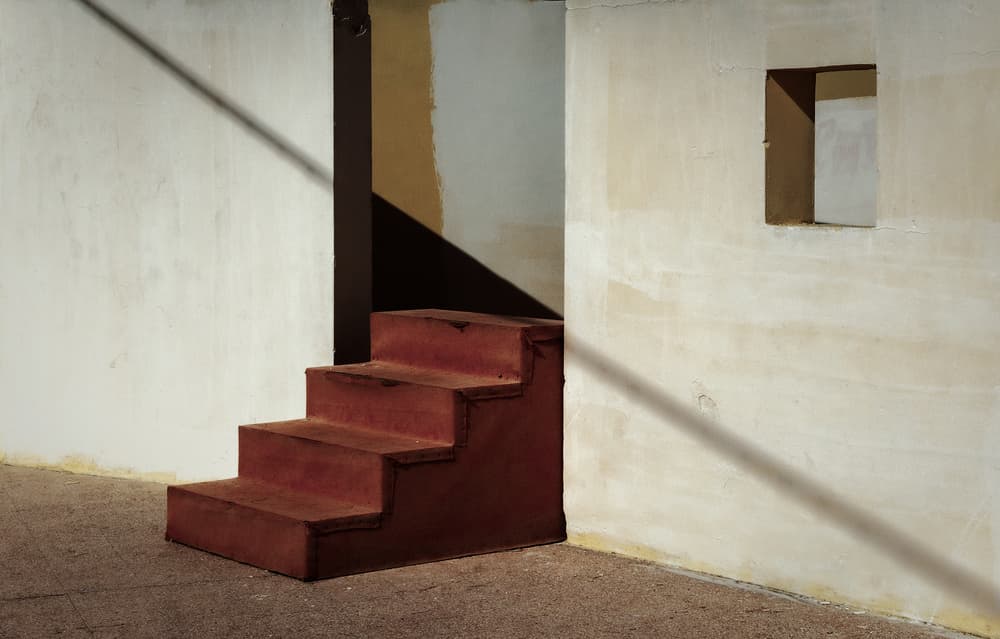 Red Stairs and Shadow by Luigi Greco — canvas wall art