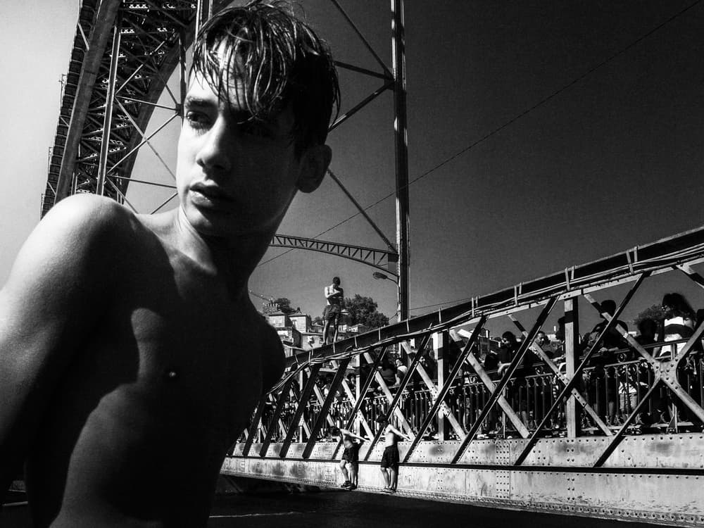 Young Man on Bridge by Laura Mexia — canvas wall art