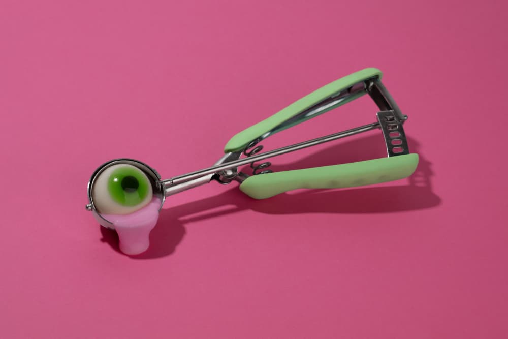 Melting Eyeball Candy Scoop by Julia Ramiro — canvas wall art