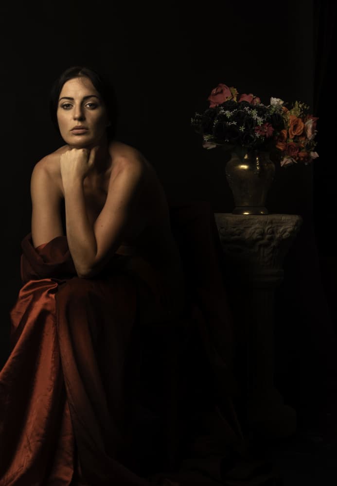 Pensive Woman Dark Flowers by Moris Raskin — canvas wall art