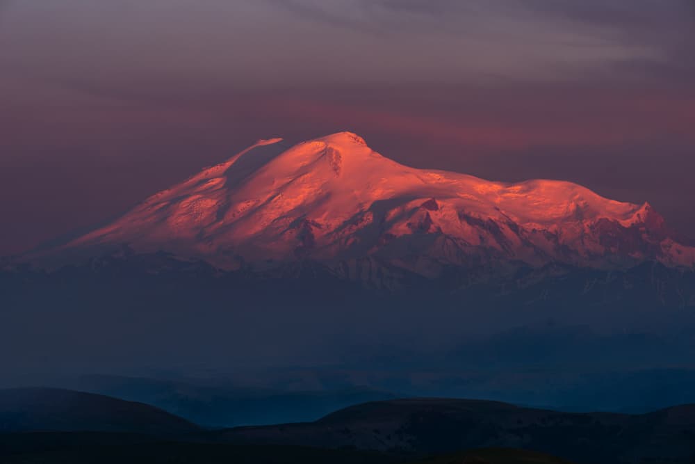 Alpenglow Mountain Peaks by Arsen Alaberdov — canvas wall art