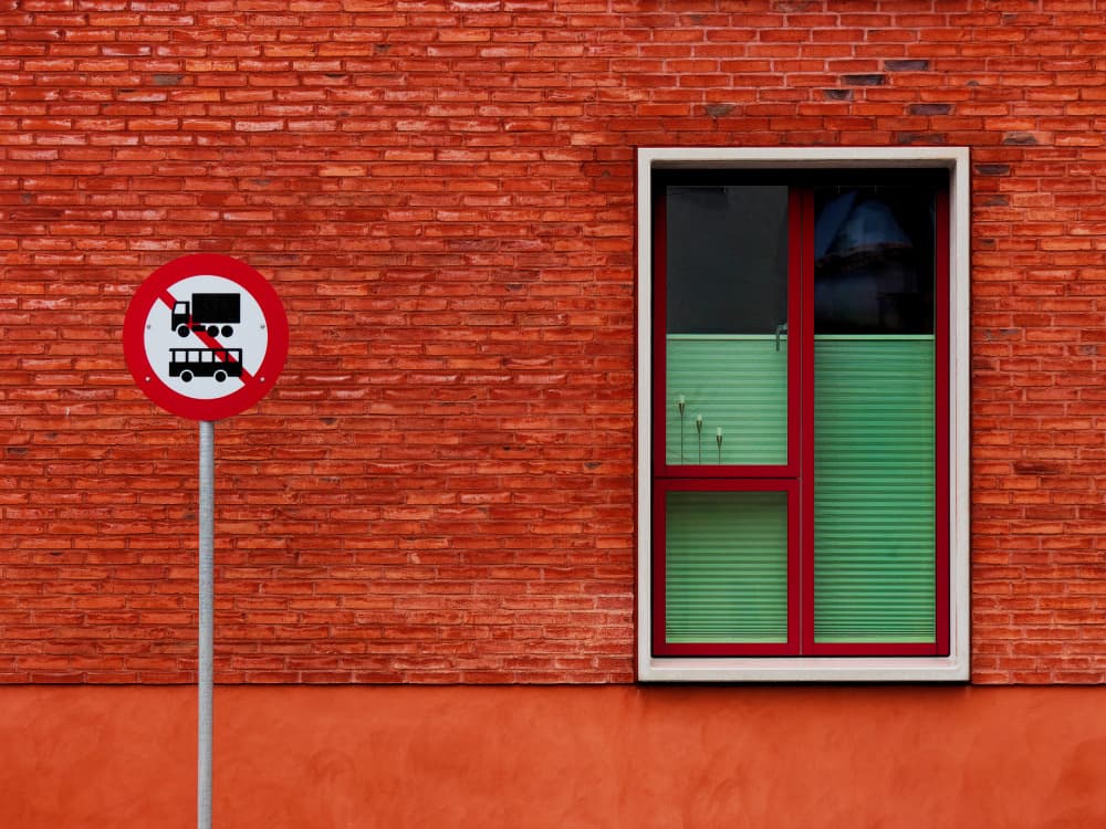 Red Brick Green Window by Marius Surleac — canvas wall art