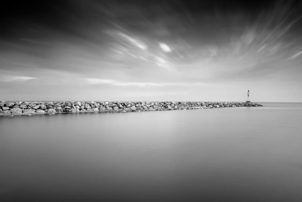 Lighthouse on Rocky Pier by Catalin Baican — canvas wall art