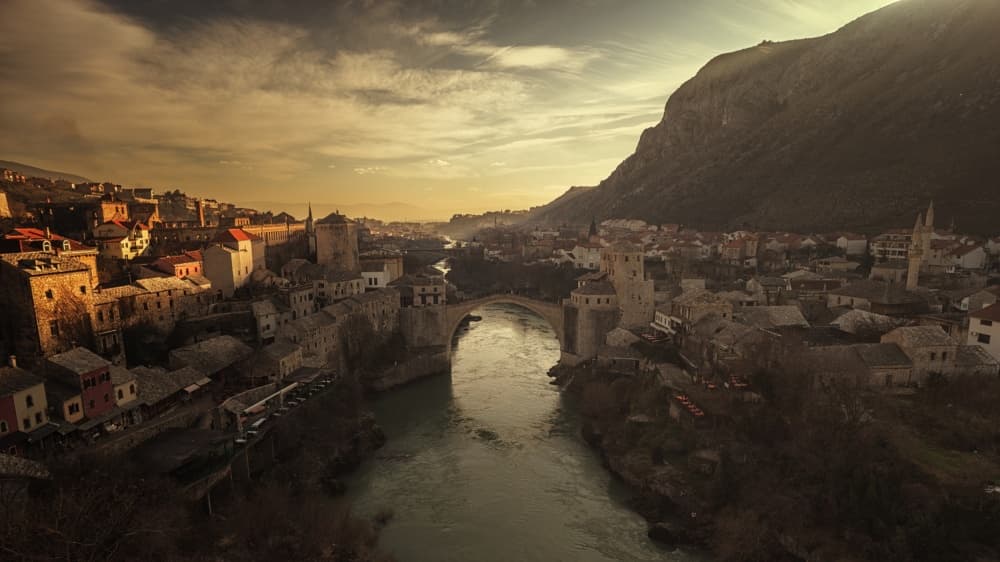 Ancient Bridge City Sunset by Bez Dan — canvas wall art