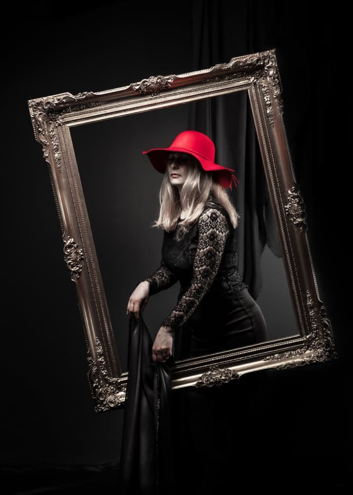 Woman In Red Hat Frame by Robert Girmencea — canvas wall art