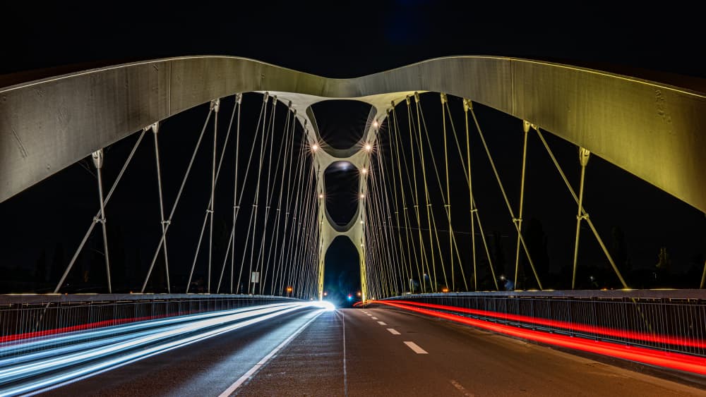 Illuminated Bridge Light Trails by Kilian CabGuy — canvas wall art