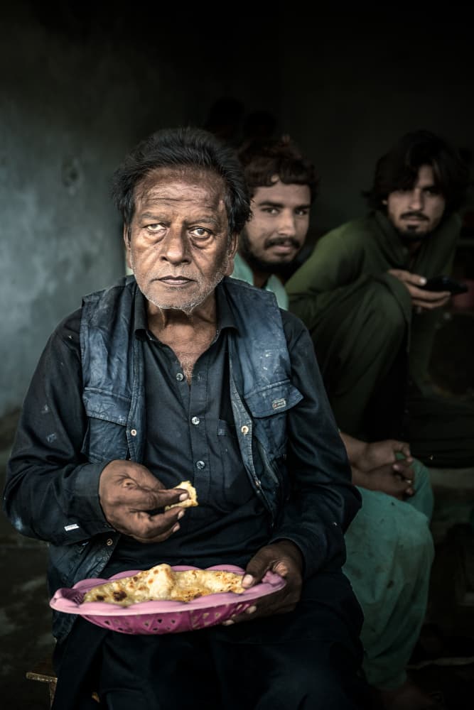 Thoughtful Man Eating by Trevor Cole — canvas wall art