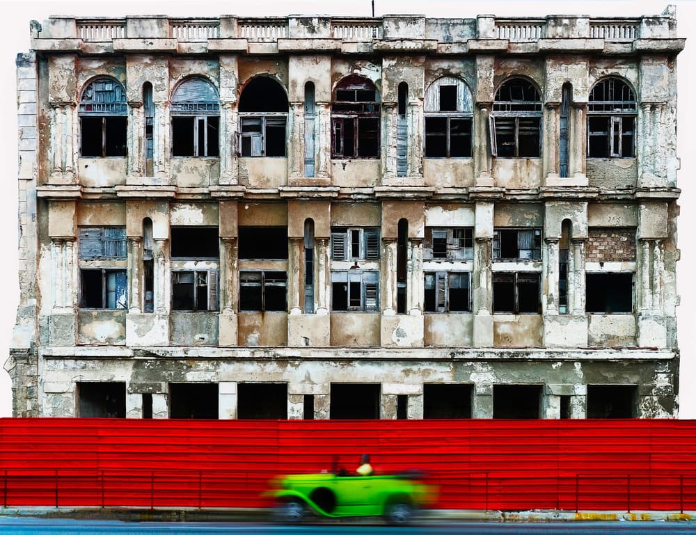 Green Car Red Wall by Ina Tänzer — canvas wall art