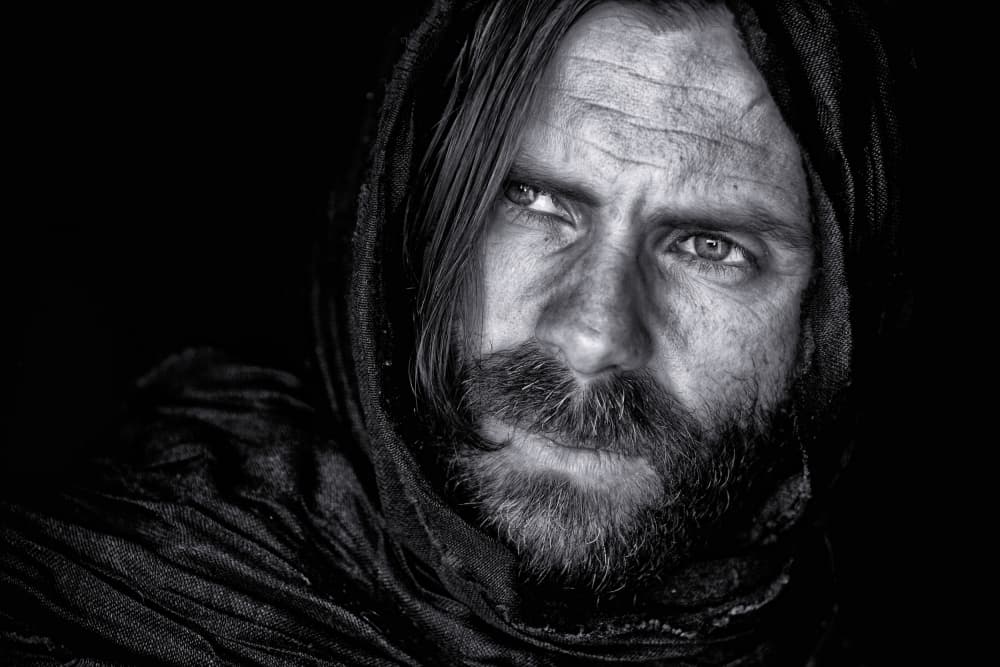 Intense Hooded Gaze by Goran Jovic — canvas wall art