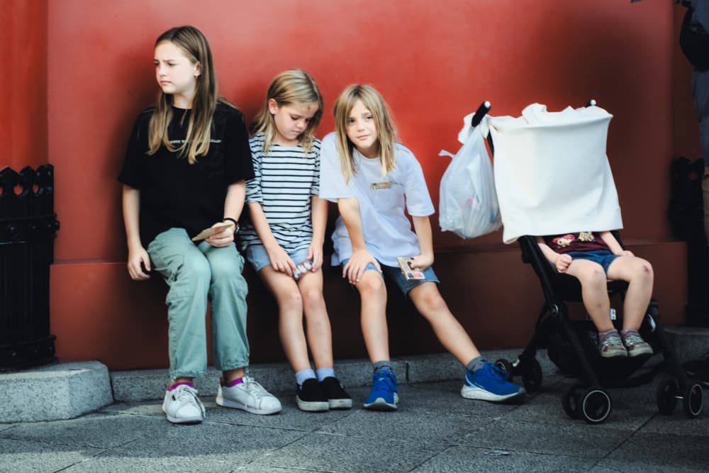 Young Girls Waiting by HIDASAN — canvas wall art