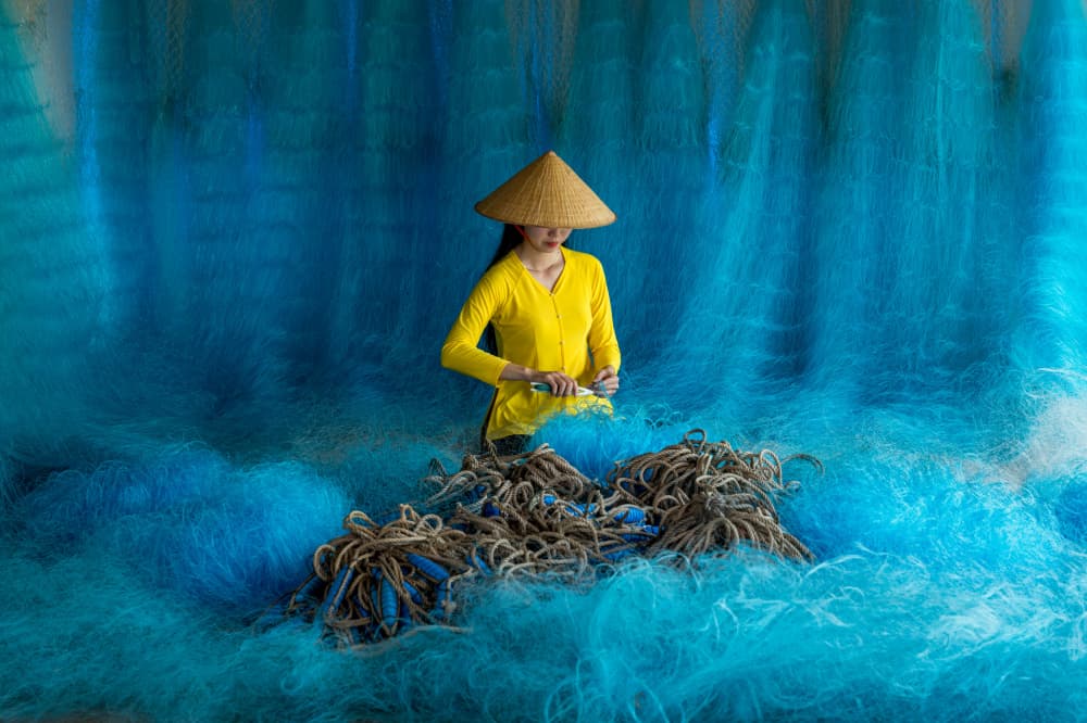 Vietnamese Blue Net Worker by HuongHoang — canvas wall art
