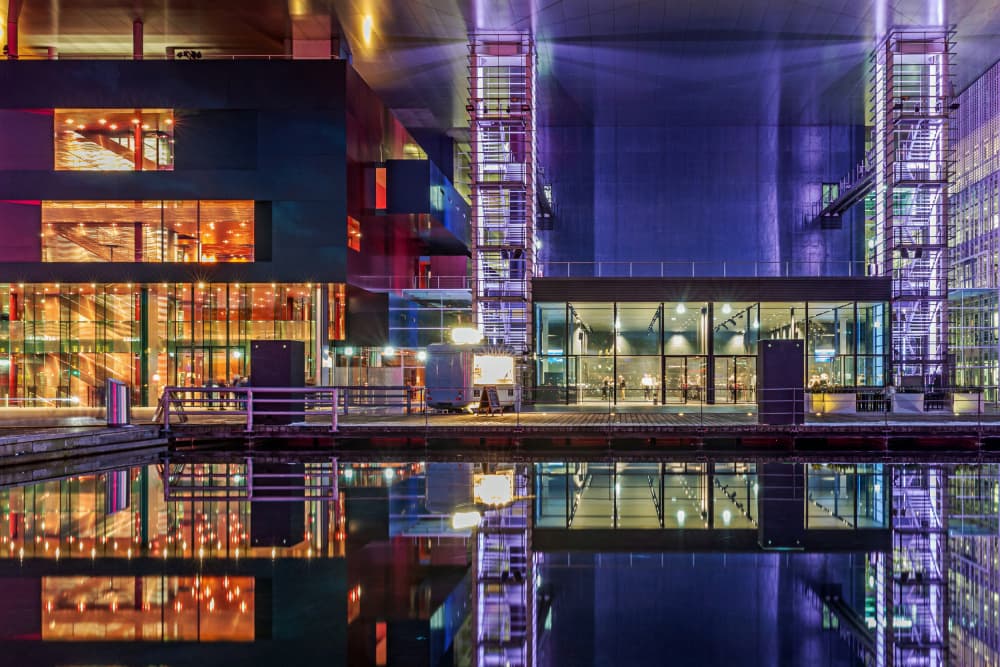 Vibrant City Reflections by Urs Zimmermann — canvas wall art