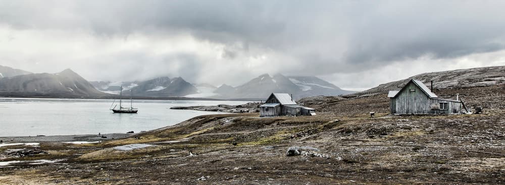 Old Arctic Ship And Cabins by Marloes van Pareren — canvas wall art