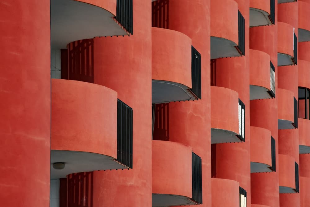 Red Balcony Curves by Linda Wride — canvas wall art