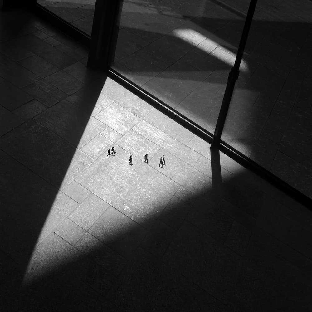 People and Dramatic Shadows by Huib Limberg — canvas wall art