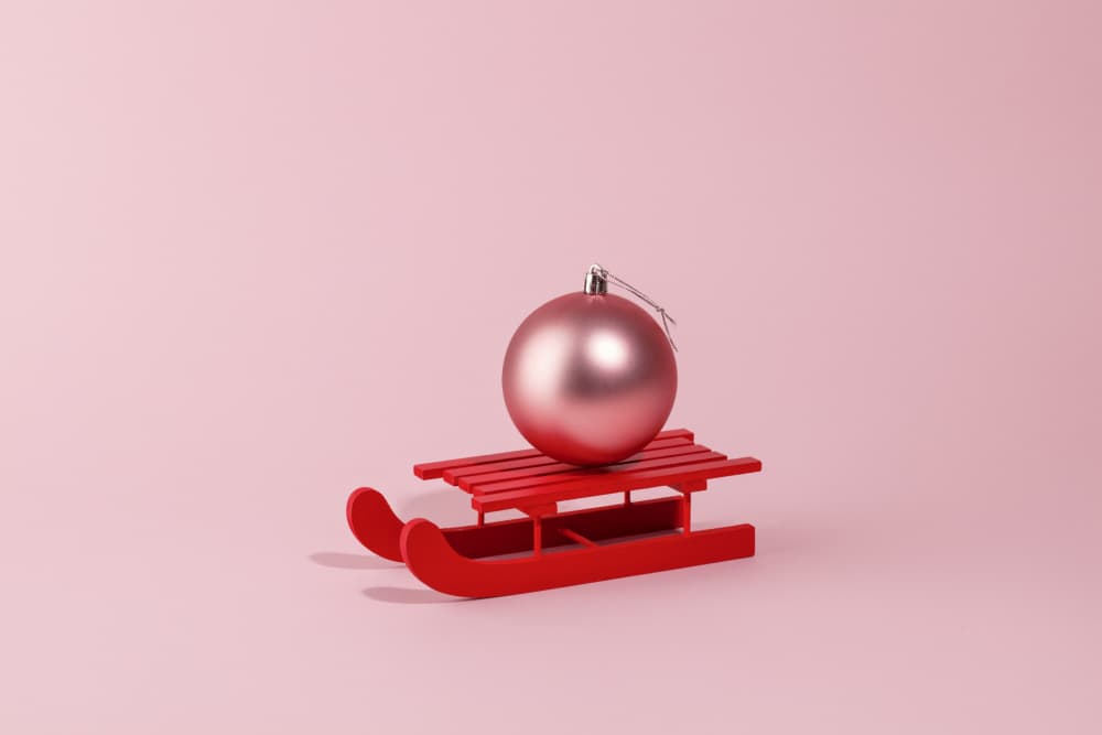 Pink Christmas Sled Ornament by Julia Ramiro — canvas wall art