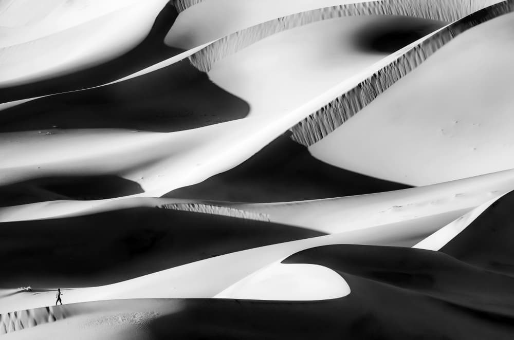 Lone Figure Desert Dunes by Andrew J. Lee — canvas wall art