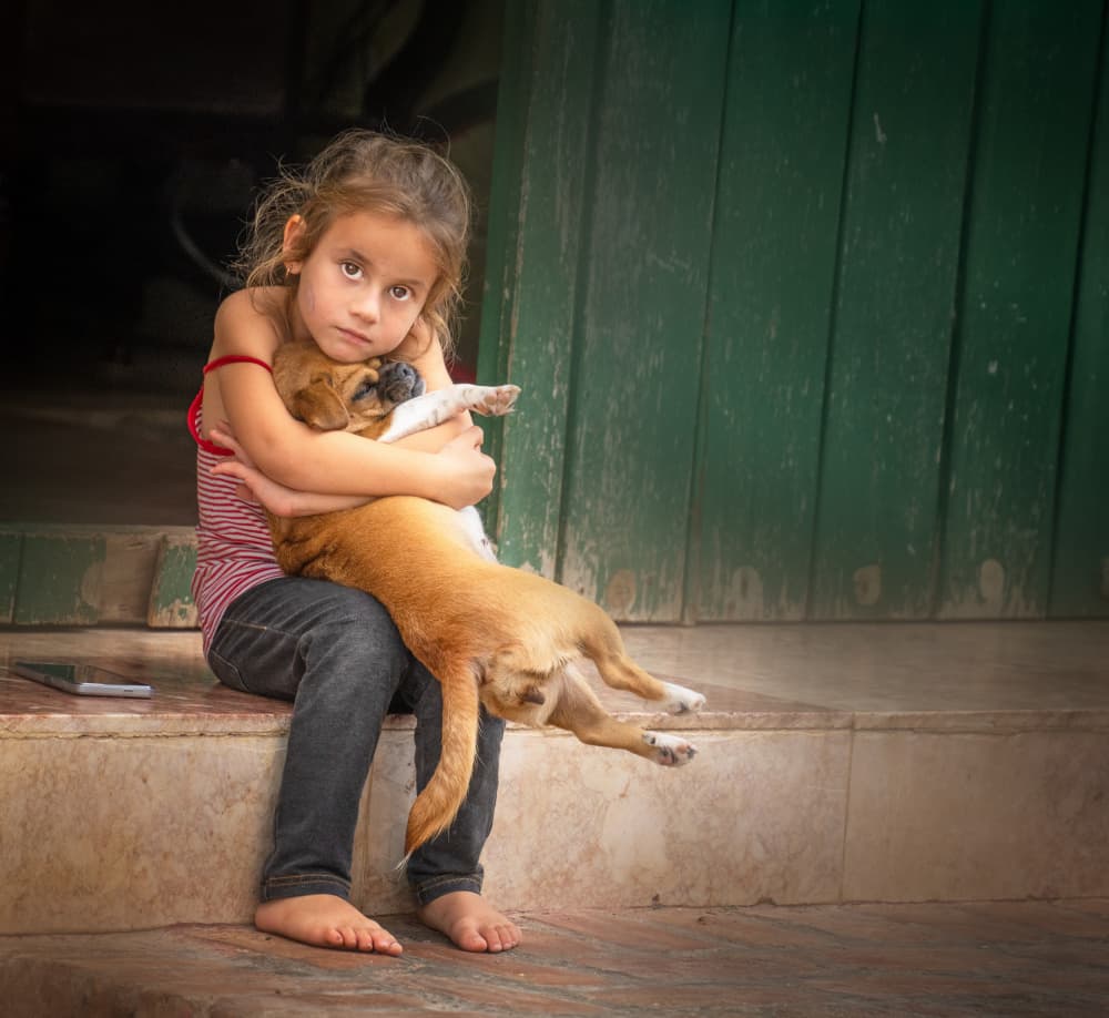 Girl Hugging Puppy by Yuan Su — canvas wall art