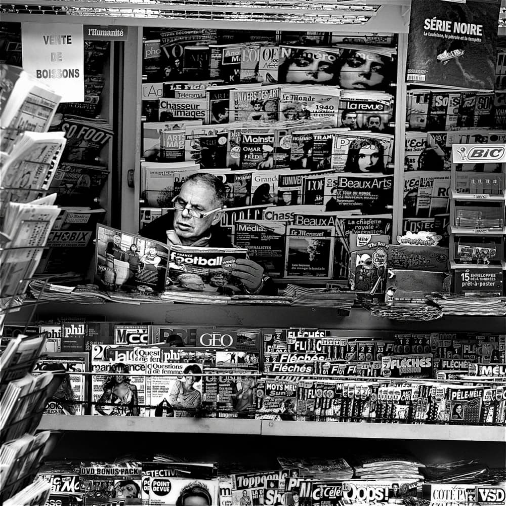 Man Reading Urban Newsstand by Didier Guibert — canvas wall art