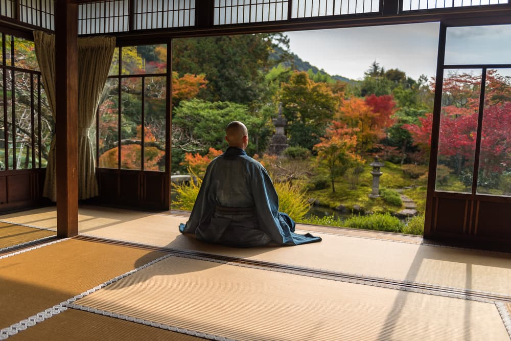 Monk Meditates Autumn Garden by Marc Pelissier — canvas wall art
