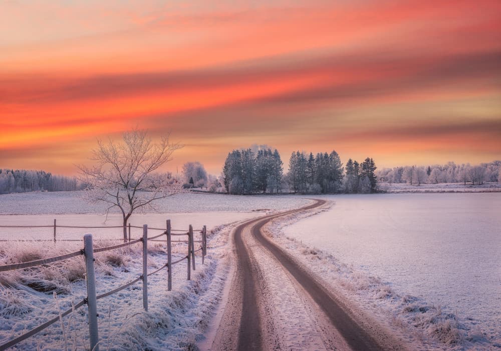 Snowy Country Road Sunset by Christian Lindsten — canvas wall art