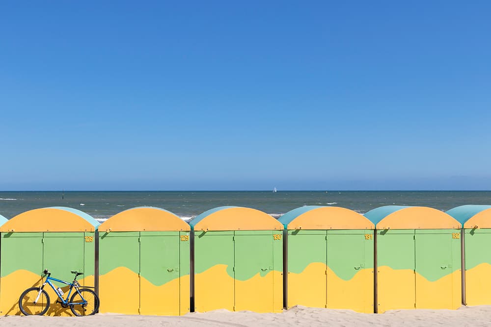 Sunny Beach Huts Bicycle by Massimo Della Latta — canvas wall art