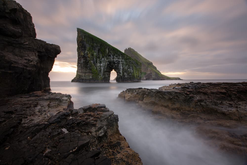Faroese Sea Arch by April Xie — canvas wall art