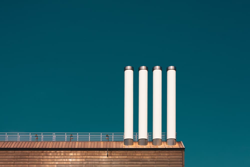 Four Modern Smokestacks by Rolf Endermann — canvas wall art