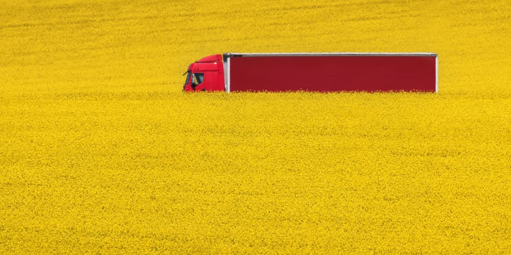 Red Truck Yellow Field by Ales Krivec — canvas wall art