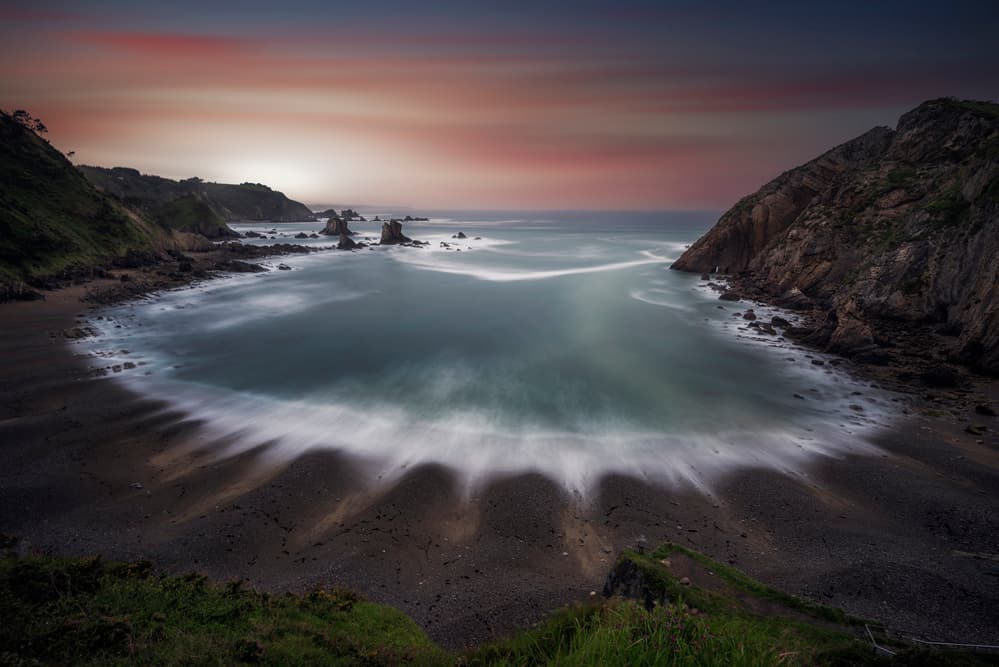 Sunset Over Rocky Bay by Jorge Ruiz Dueso — canvas wall art