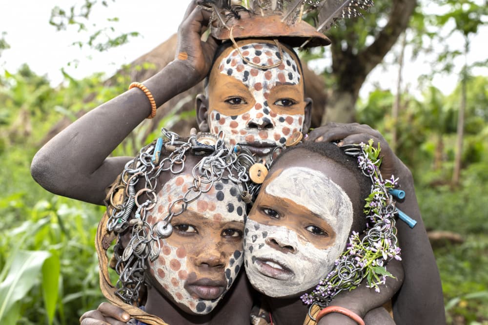 Young Tribal Faces by Iris Wiener — canvas wall art