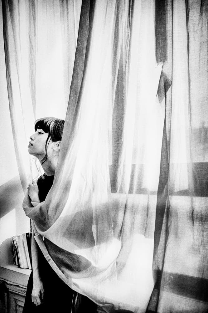 Pensive Woman Window Light by Masatoshi Washimi — canvas wall art