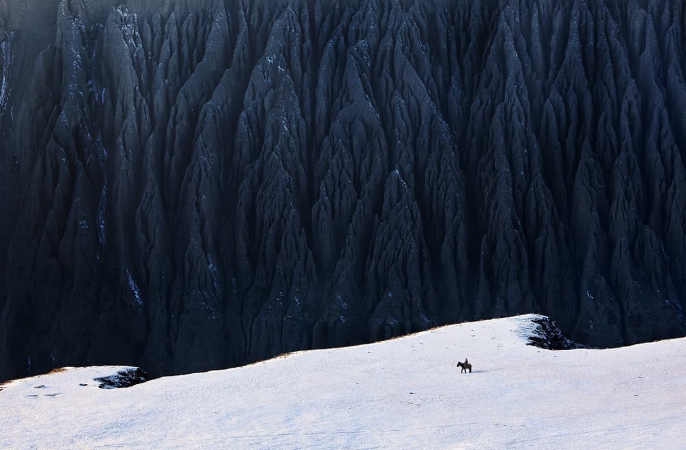 Solitary Ride Winter Peaks by BJ Yang — canvas wall art