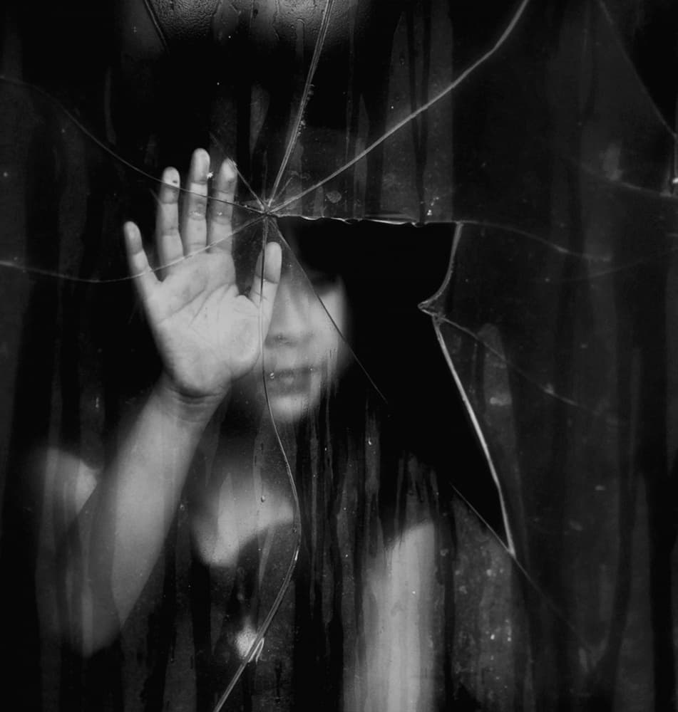 Child's Hand on Cracked Glass by Hari Sulistiawan — canvas wall art