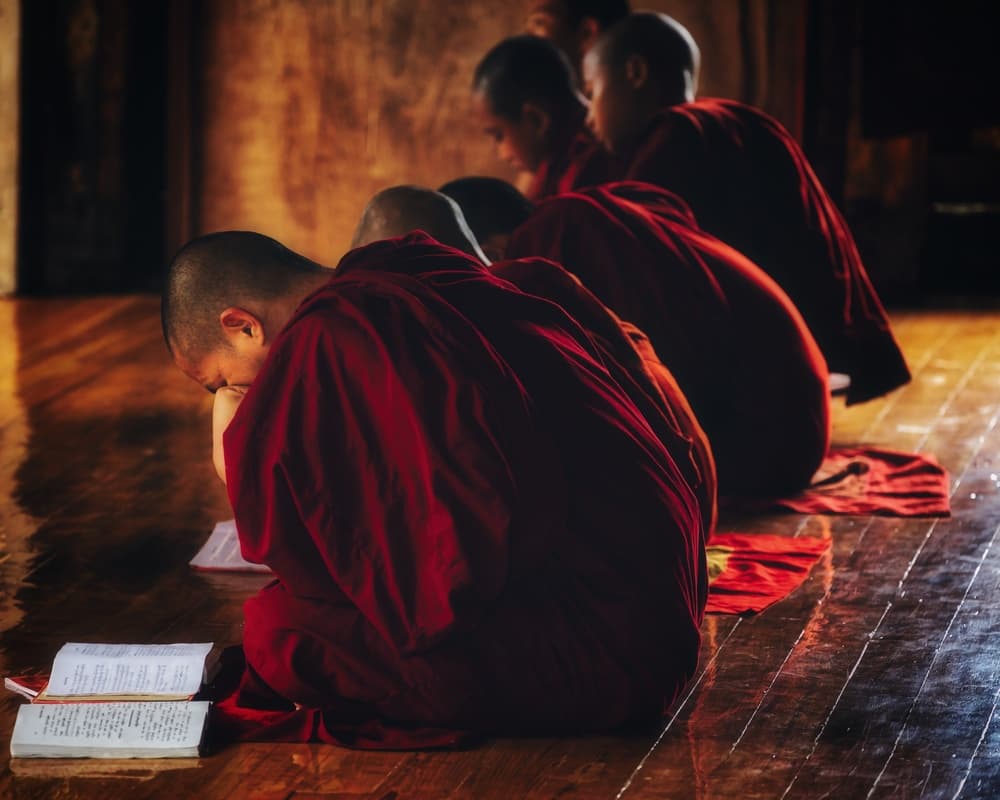Buddhist Monks Reading by txules — canvas wall art