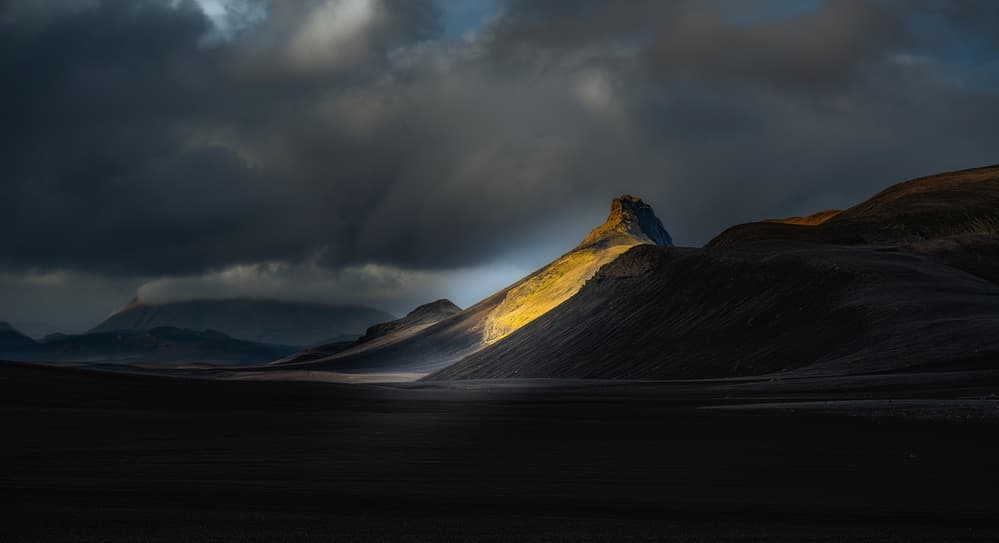 Dramatic Sunlit Peak by Ronny Olsson — canvas wall art