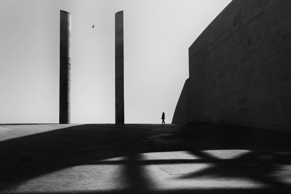 Lone Figure Architecture by Alexander Jikharev — canvas wall art