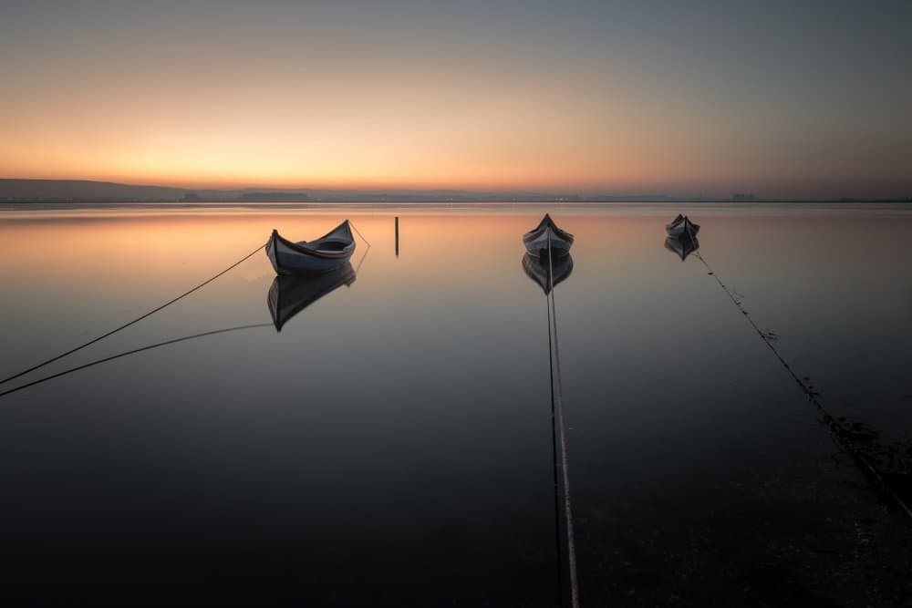 Tranquil Evening Boats by Marco Faria — canvas wall art