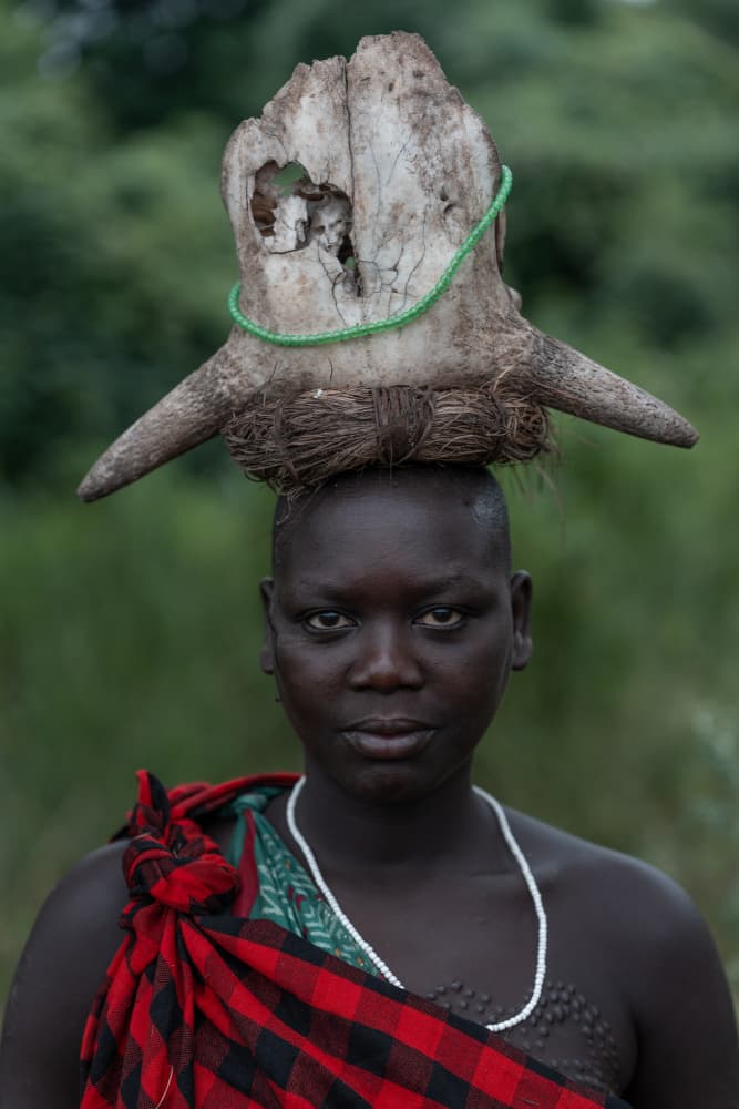 African Woman Skull Headdress by HuongHoang — canvas wall art