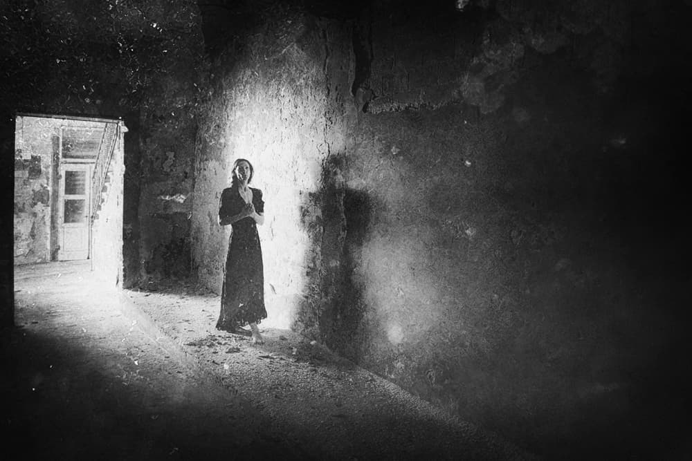 Solitary Woman Dark Room by Enrico Facchetti — canvas wall art
