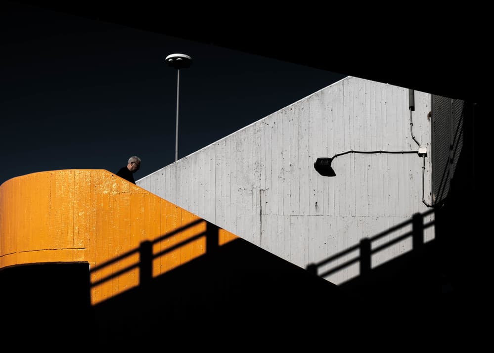 Man on Geometric Stairs by Gaia Rampon — canvas wall art
