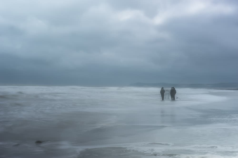 Moody Coastal Figures by Hilde Ghesquiere — canvas wall art