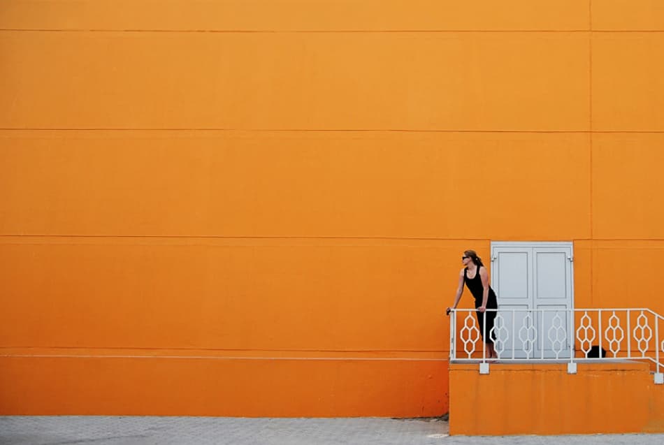 Woman Vibrant Orange Wall by Marcus Bj [ Ö ] rkman — canvas wall art