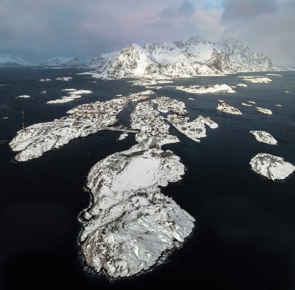 Snowy Island Village by Jie Jin — canvas wall art