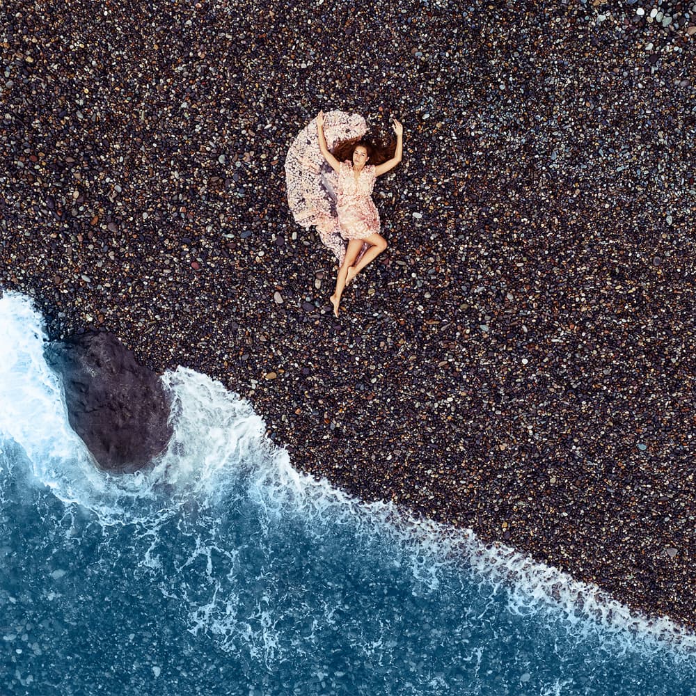 Serene Woman Pebble Beach by Mike Darzi — canvas wall art