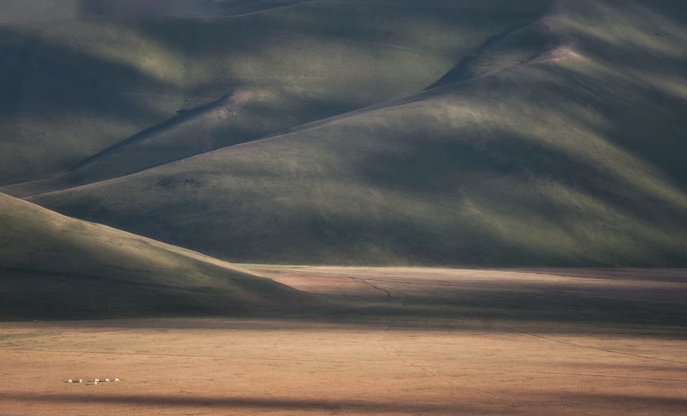 Light Across Rolling Hills by Roberto Marchegiani — canvas wall art